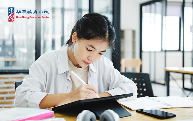 Asian Preteen Girl Doing a Homework