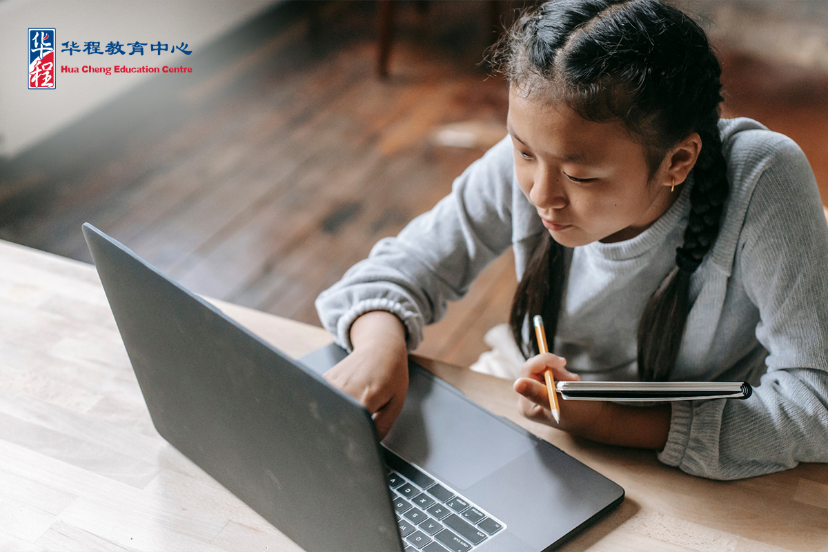 Pretty Asian Preteen Girl Doing A Homework