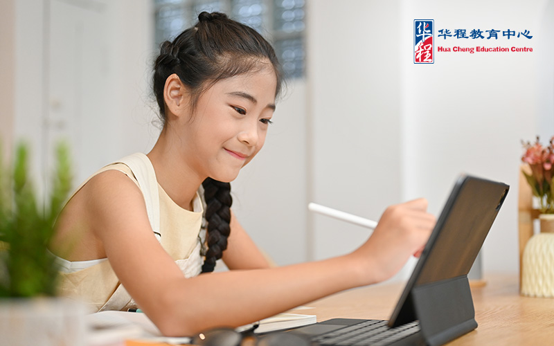 Pretty Asian Young Girl Using Digital Tablet