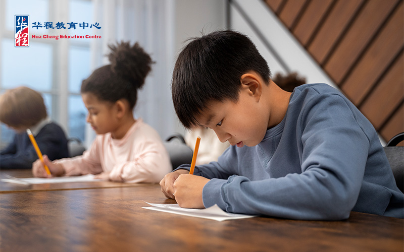 Children taking tests at chinese tuition centre